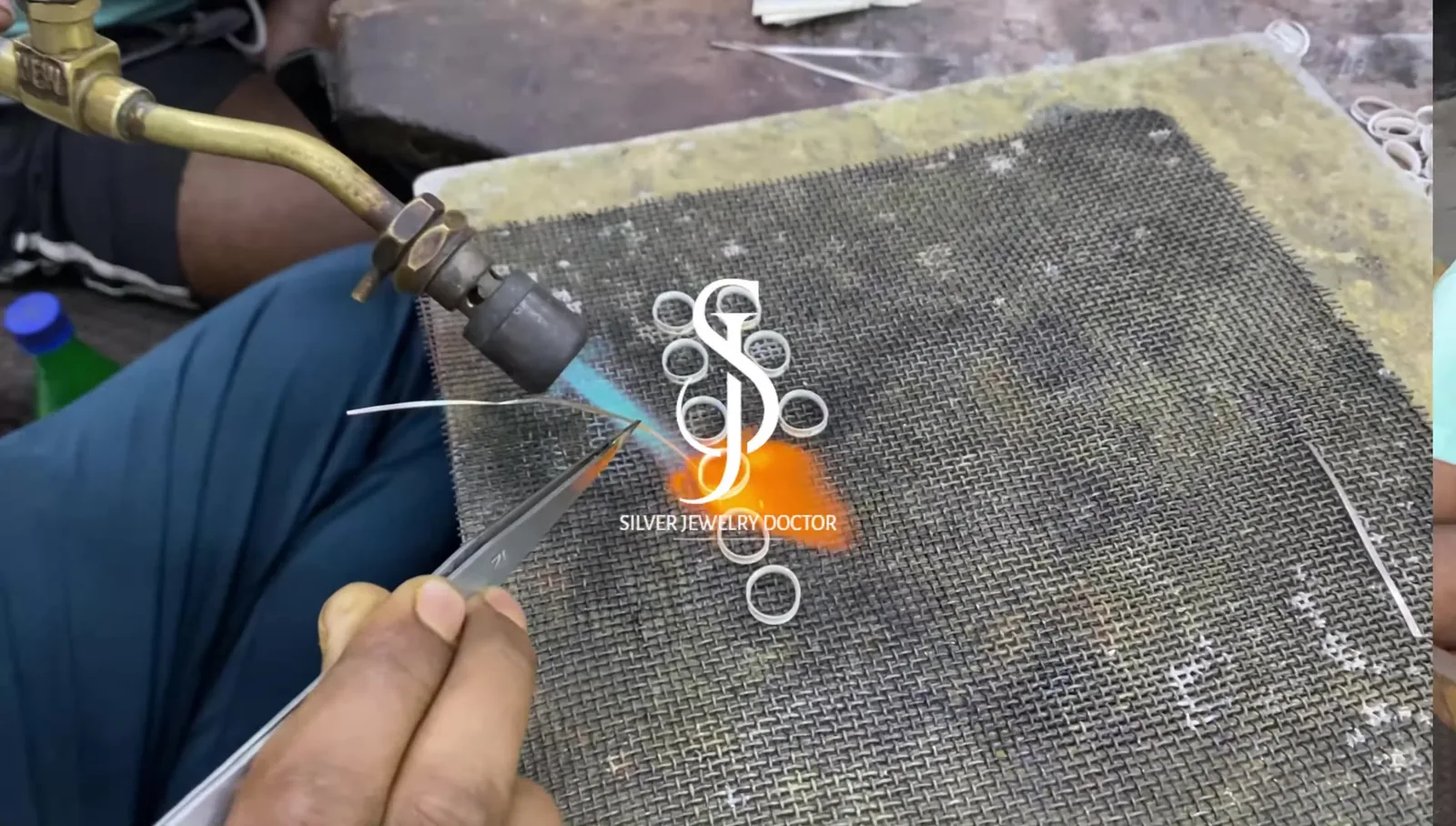Sterling silver components being soldered by hand at the Jaipur workshop