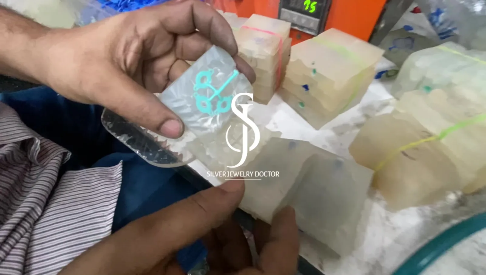 Blue wax jewellery patterns prepared in a silicone mould at Silver Jewelry Doctor's Jaipur workshop
